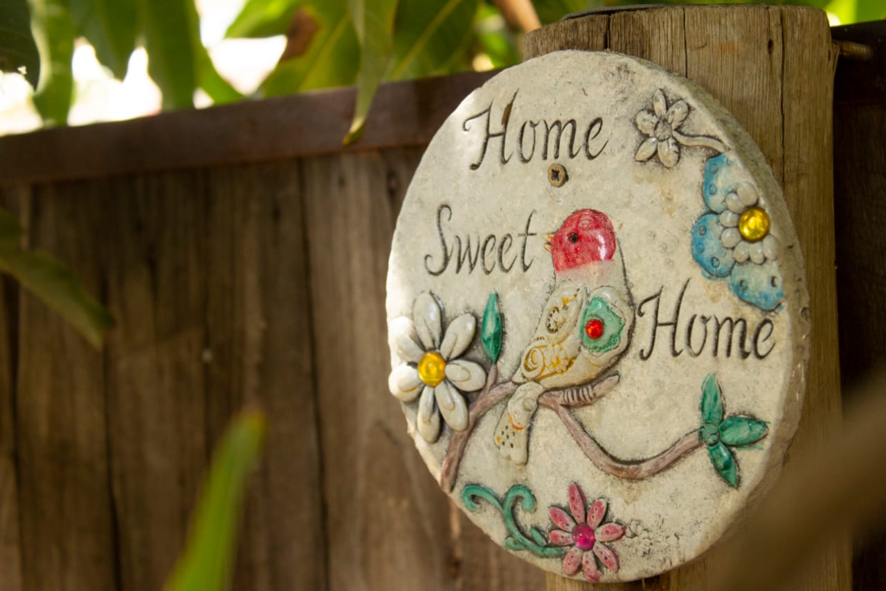 Home Sweet Home sign in the garden